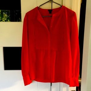 Polka dot red blouse long sleeves